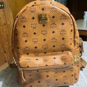 MCM mens stark side studded backpack